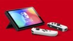 Nintendo Switch (modelo OLED) con base y mandos Joy-Con blancos - Imagen 5